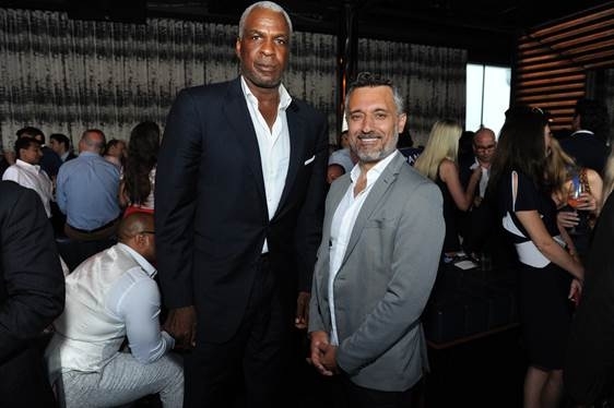 Selman Yalcin with Charles Oakley is a former American professional basketball player. 