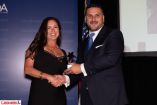Lolita Zinke receives her Friend of Turkey Award from Cenk Ocal, Turkish Airlines General Manager in New York. 