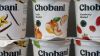 In this Monday, Nov. 20, 2017 photo, Chobani yogurt cups are displayed in New York. Chobani, the company that helped kick-start the Greek yogurt craze, is shrinking those words from its label as it hints it may expand beyond that food in an increasingly crowded yogurt market. 