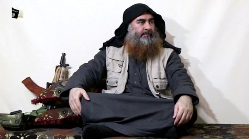 FILE PHOTO: A man purported to be the reclusive leader of the militant Islamic State Abu Bakr al-Baghdadi has made what would be his first public appearance at a mosque in the centre of Iraq&#039;s second city, Mosul, according to a video recording posted on the Internet on July 5, 2014, in this still image taken from video. Social Media Website via Reuters TV/File Photo