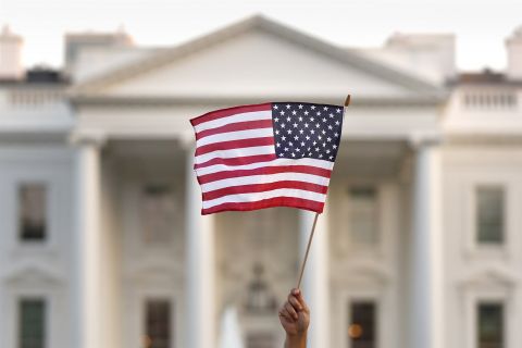 A flag is waved outside the White House in September 2017.Carolyn Kaster / AP file