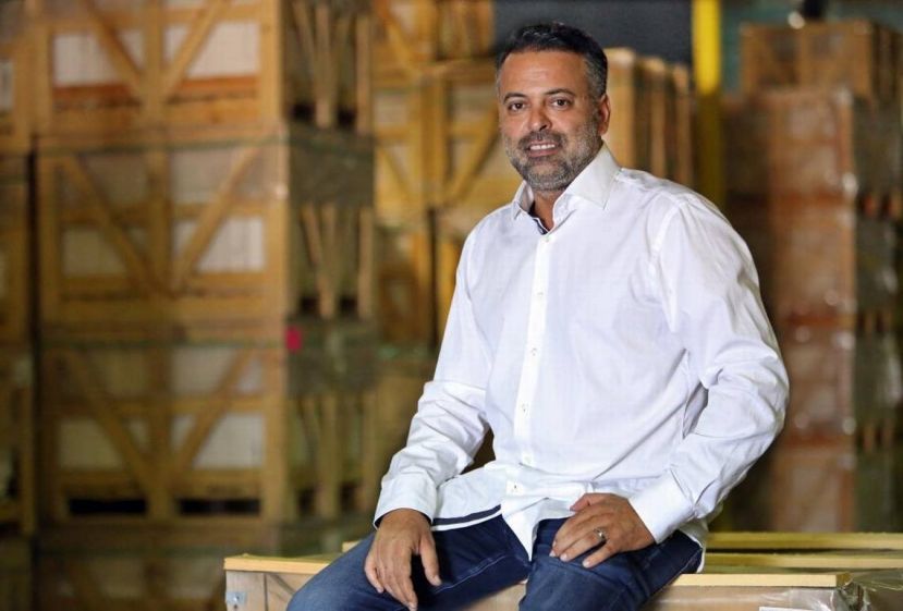  BOS Group CEO/Founder Ozan Baran in his Allapattah warehouse. Emily Michot emichot@miamiherald.com 